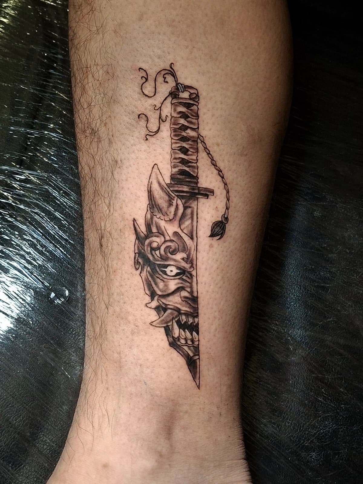 japanese hannya mask and katana forearm tattoo by isaiah recongco — gorillaz tattoo art studio philippines
