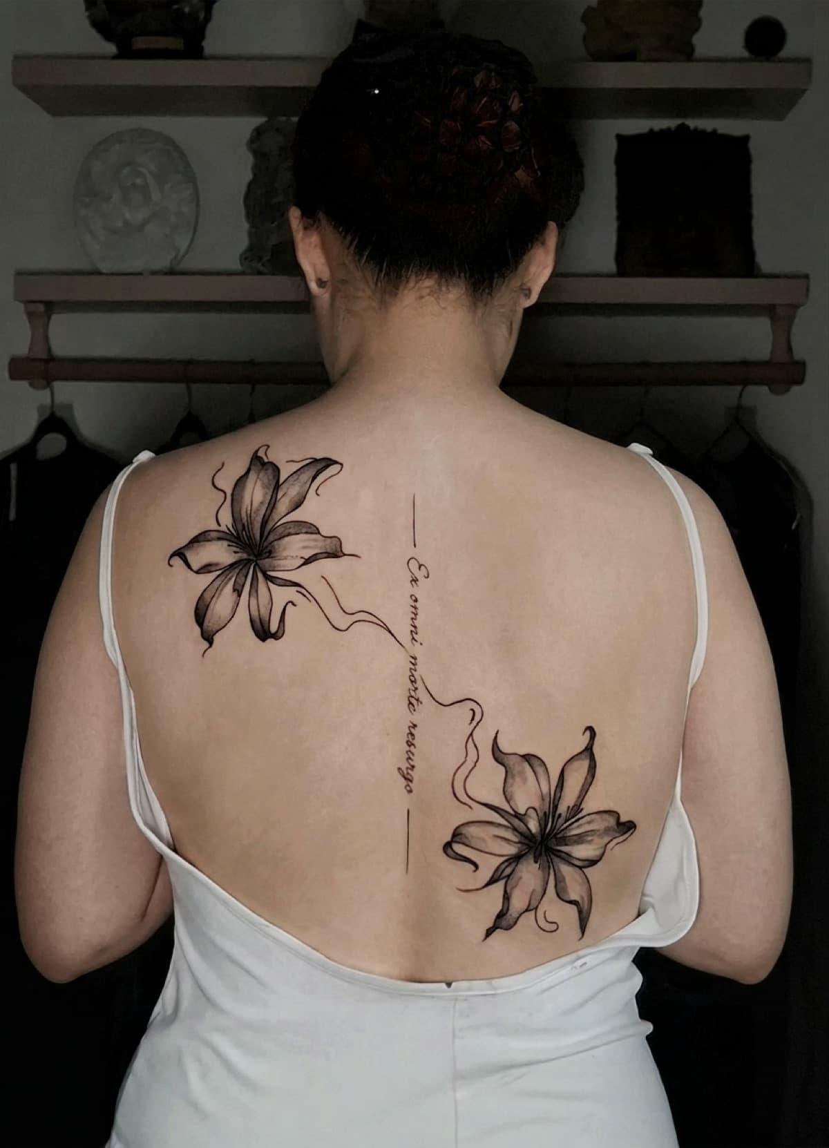 fine line lily flowers spine tattoo by isaiah recongco — gorillaz tattoo art studio philippines