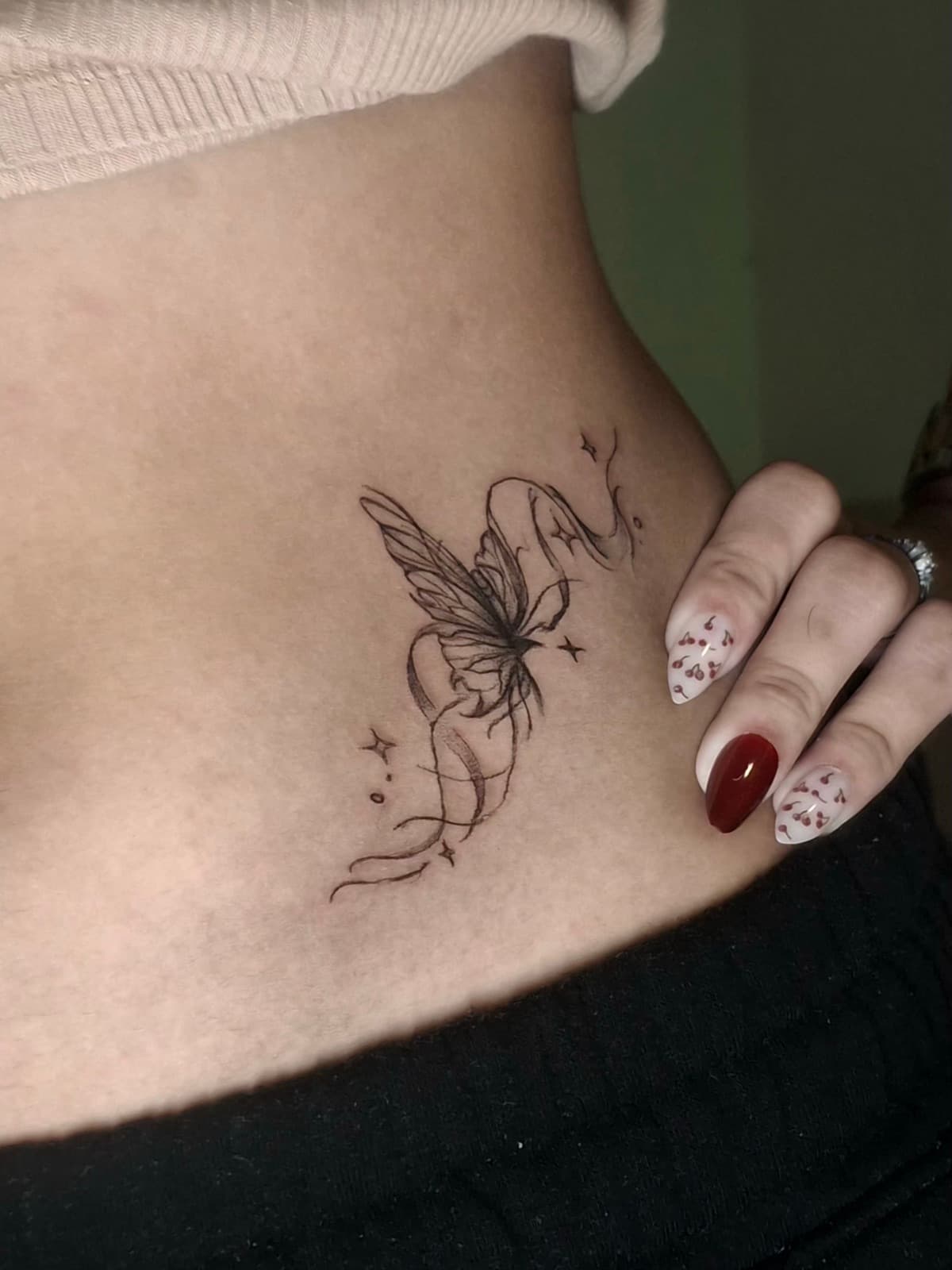minimalist butterfly and stars hip tattoo by isaiah recongco — gorillaz tattoo art studio philippines